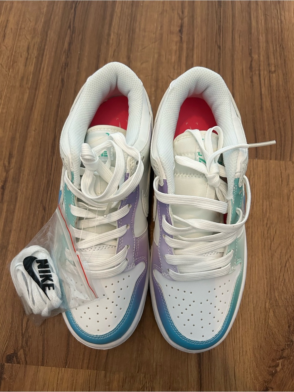 Nike White Sneakers with Teal, Lavender & Pink Accents